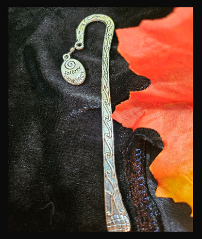 Bookhook: Silver sherpherd's crook with a "follow your heart" charm